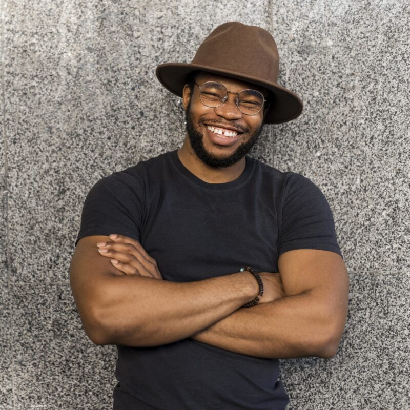 smiley-african-american-man-wearing-round-glasses