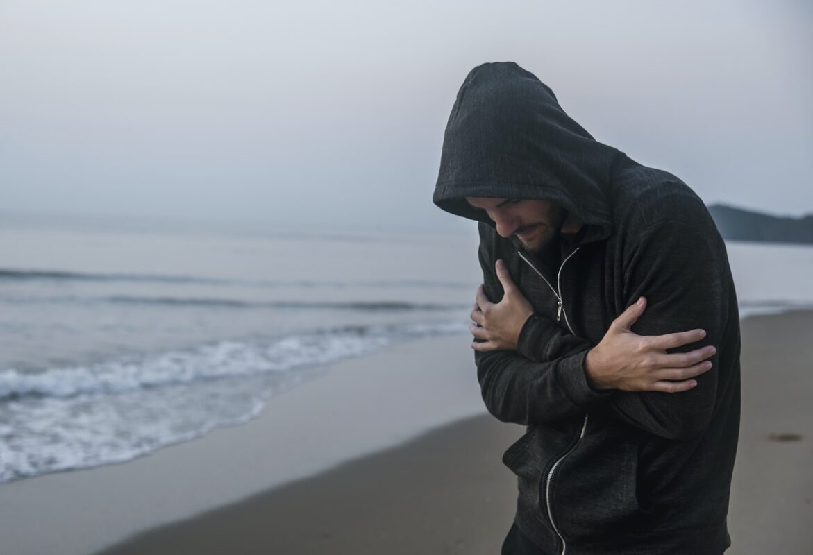 man-beach-in-distress